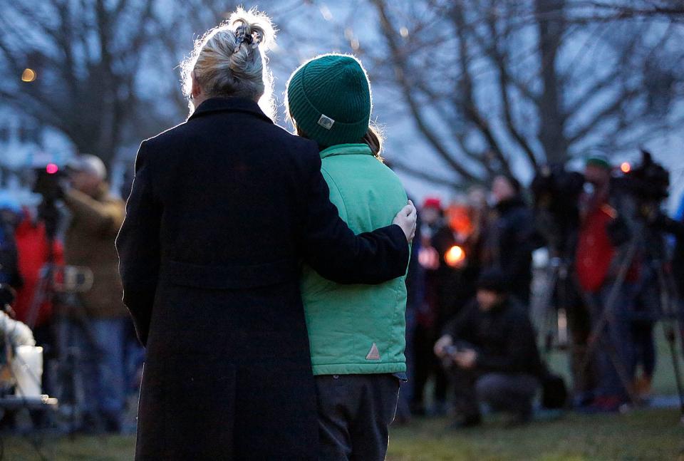 Cohasset residents gather on the town common for a vigil to honor Ana Walshe and her children on Thursday, Jan. 12, 2023.