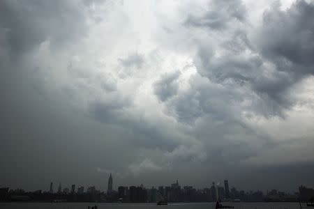 A large storm looms over the skyline of New York June 3, 2014. REUTERS/Lucas Jackson