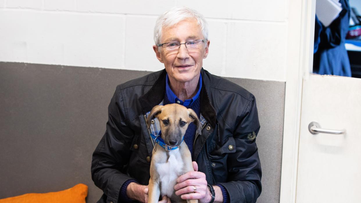  Paul O'Grady with a puppy on his lap for For the Love of Dogs season 11 