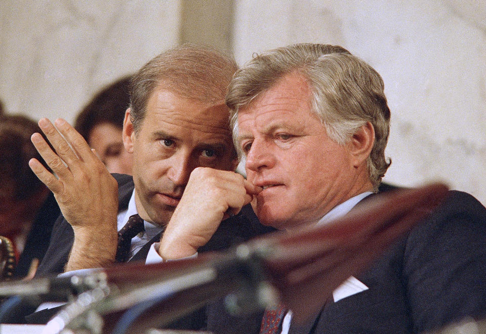 FILE - Senate Judiciary Chairman Joseph Biden Jr., of Delaware, left, speaks with Sen. Edward Kennedy, D-Mass., during the confirmations hearings for Supreme Court nominee Robert H. Bork on Capitol Hill in Washington, Sept. 16, 1987. During the hearing Biden focused his questioning on Griswold v. Connecticut, a 1965 decision that allowed married couples to buy birth control. “If we tried to make this a referendum on abortion rights, for example, we’d lose," he wrote in his 2007 memoir, “Promises to Keep.” (AP Photo/John Duricka, File)