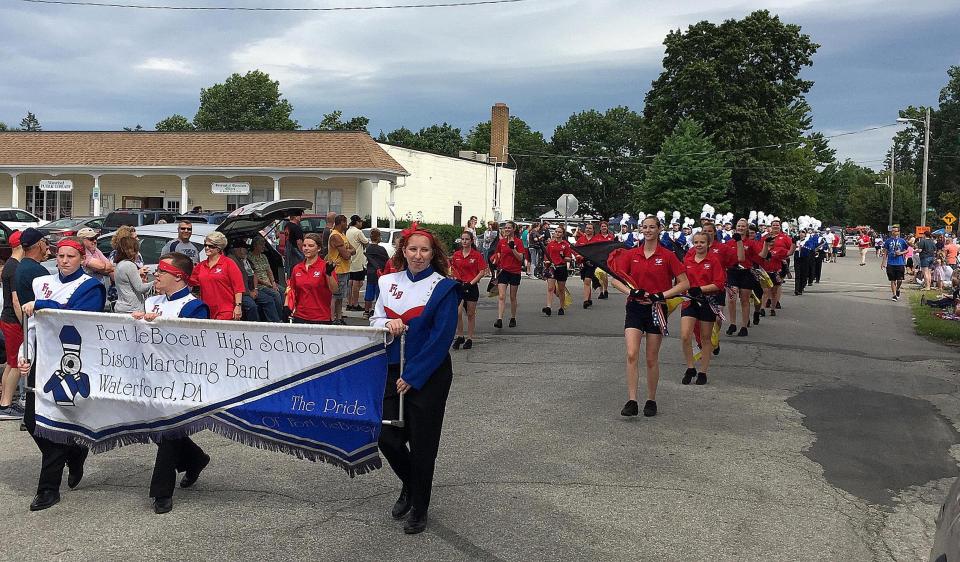 Members of the Fort LeBoeuf High School Marching Band participate in the Waterford Heritage Days parade on July 21, 2018, along Cherry Street in Waterford.