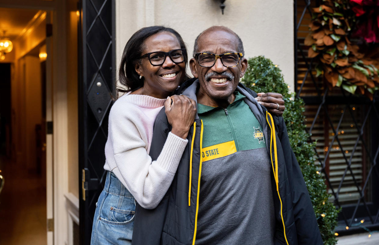 Deborah Roberts and Al Roker during a Christmas caroling surprise. (Nathan Congleton / NBC)