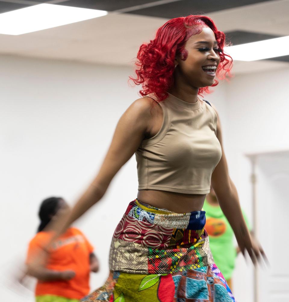 Dancers groove to live percussion music as the Ayoka Afrikan Drum and Dance Incorporation rehearses on Monday, Feb. 6, 2023 in Tallahassee, Fla. 