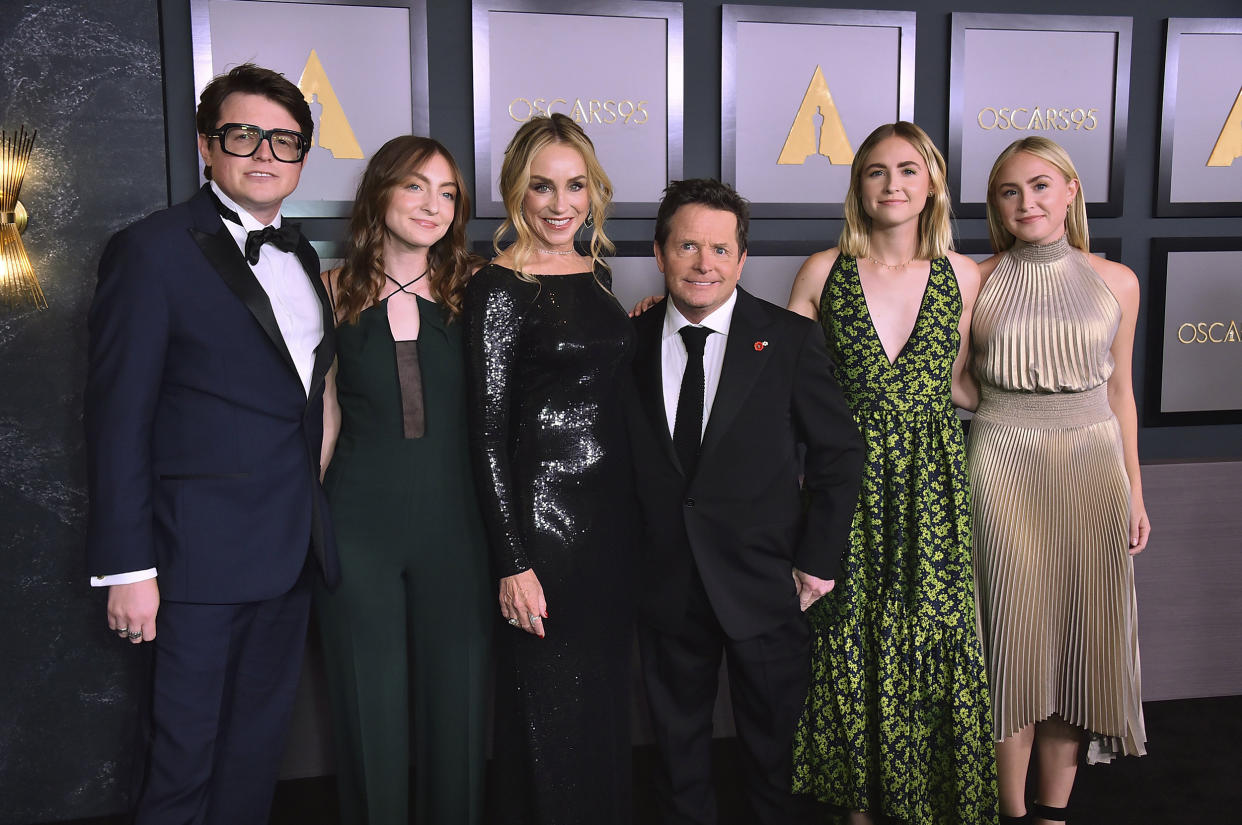 From left, Sam Fox, Esme Fox, Tracy Pollan, Michael J. Fox, Schuyler Fox and Aquinnah Fox arrive at the Governors Awards on Saturday, Nov. 19, 2022, at Fairmont Century Plaza in Los Angeles. (Jordan Strauss / AP)