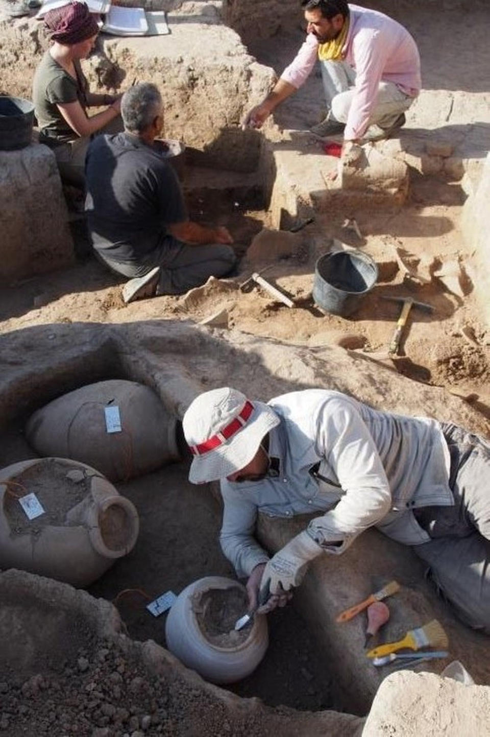 The 92 cuneiform tablets were found in a pottery vessel in the remains of a palace. <cite>Peter Pfälzner, University of Tübingen. Photo by Peter Pfälzner, University of Tübingen</cite>