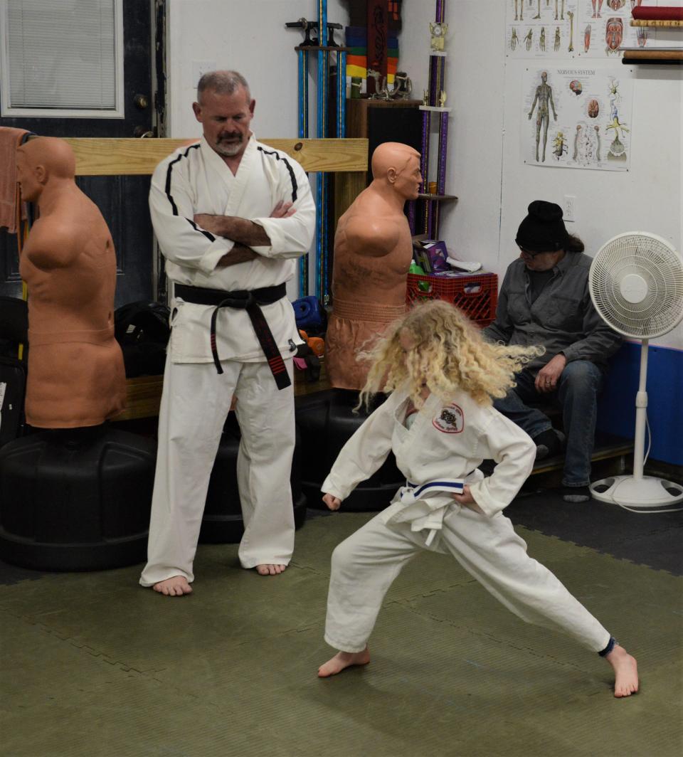 Master Brad Seward works with Sydney Hollingsworth in the Junior Warrior Advanced class of his Coszacks Elite Defense System. He was recently inducted into the Cleveland Martial Arts Hall of Fame.