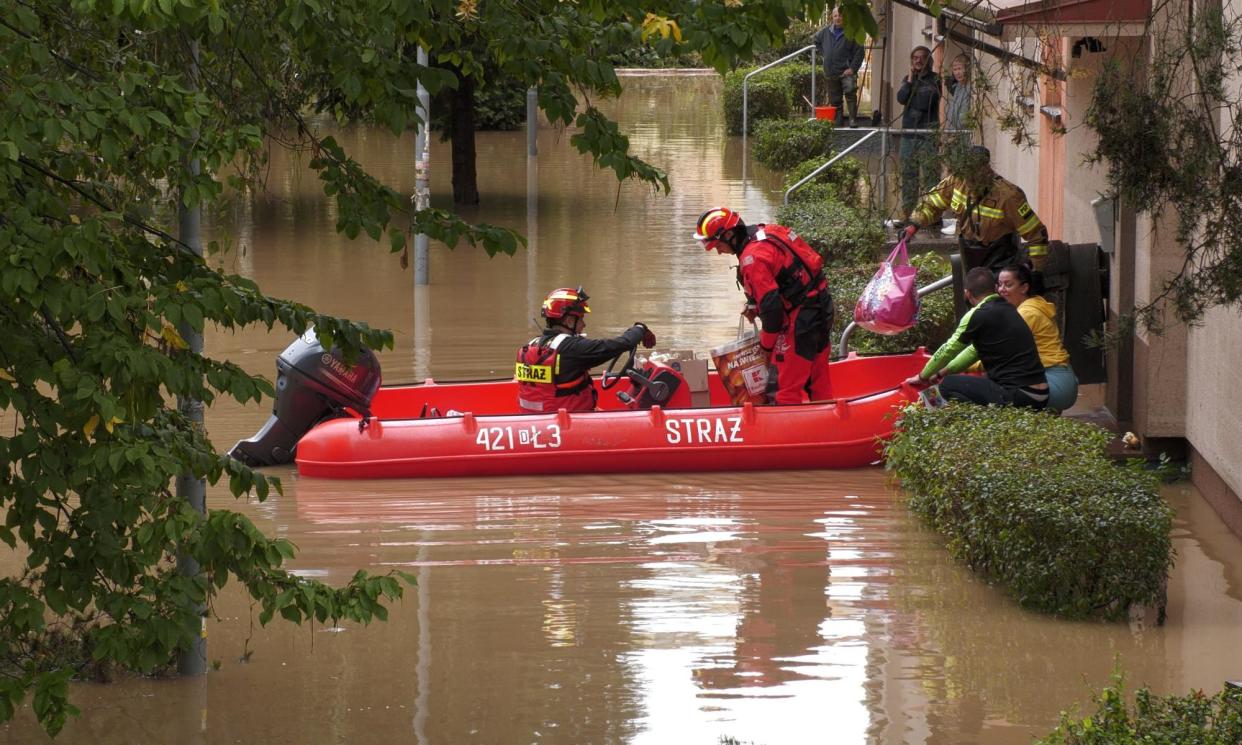 <span>A flooded street in Kłodzko, Poland. In Głuchołazy, the floods collapsed a bridge and washed houses away.</span><span>Photograph: Action Press/Rex/Shutterstock</span>