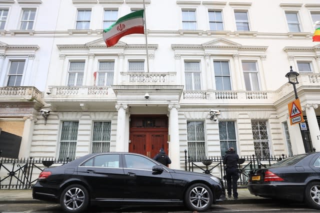 Police officers outside the Iranian Embassy in Knightsbridge, London 