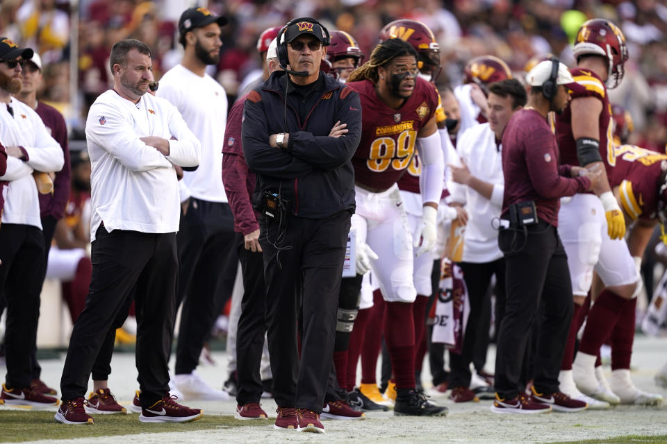 Washington Commanders head coach Ron Rivera stands on the sideline during the first half of an NFL football game against the Cleveland Browns, Sunday, Jan. 1, 2023, in Landover, Md. (AP Photo/Patrick Semansky)