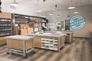 The new in-store experience for The UPS Store network resembles a contemporary open concept workshop, with light-industrial design elements and visible work areas