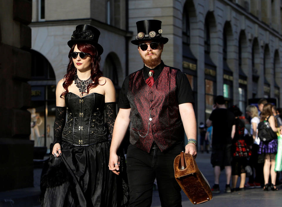 <p>Participants of the Wave and Goth festival walk through a street in Leipzig city center, Germany, June 2, 2017. (David W Cerny/Reuters) </p>