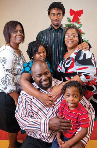 Tameika Walton (right, center) and her family in 2010, when they were receiving housing and other services from Jacksonville nonprofit Family Promise. After a series of crises, Walton said, life was finally looking up.