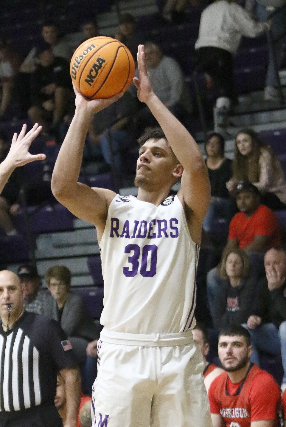 Mount Union's Braedon Poole puts up a 3-point shot, Wednesday, Feb. 15, 2023.
