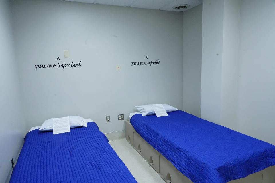 Two twins beds inside a crisis stabilization room at Lewis and Clark Behavioral Services located inside the Benedictine Center on the Avera Sacred Heart Hospital Campus in Yankton, South Dakota, on Monday, Sept. 25, 2023.