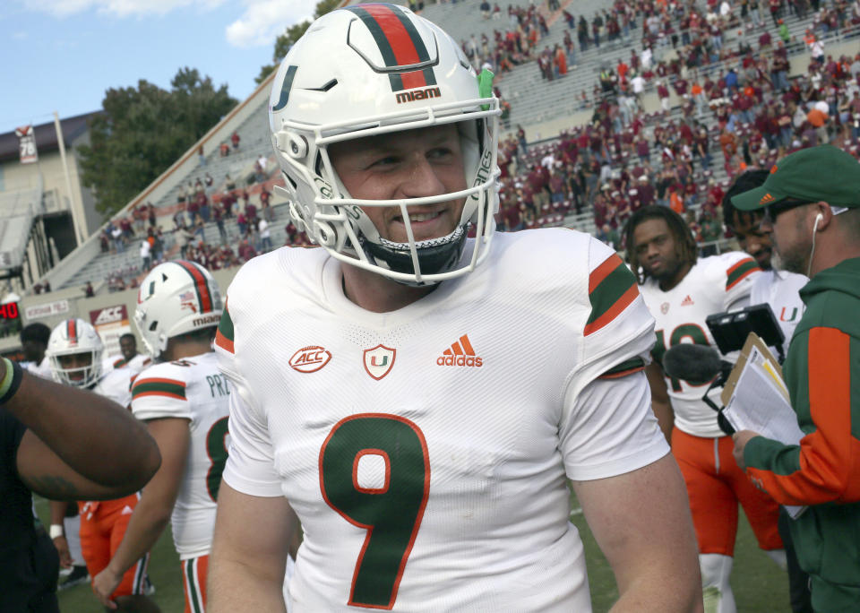 Miami quarterback Tyler Van Dyke (9) walks off the field after an NCAA football game against Virginia Tech, Saturday Oct. 15 2022, in Blacksburg Va. (Matt Gentry/The Roanoke Times via AP)