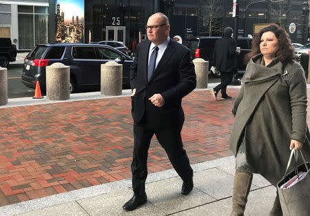FILE PHOTO: Former Georgeson LLC employee Charles Garske (L) enters the federal courthouse in Boston, Massachusetts, U.S., February 26, 2018. REUTERS/Nate Raymond/File Photo