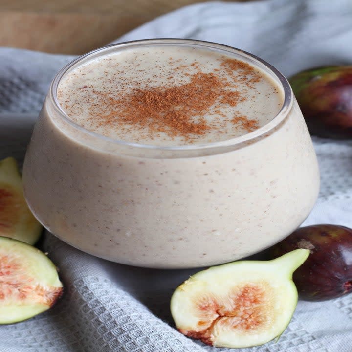 A cup of smoothie made from fig and tahini