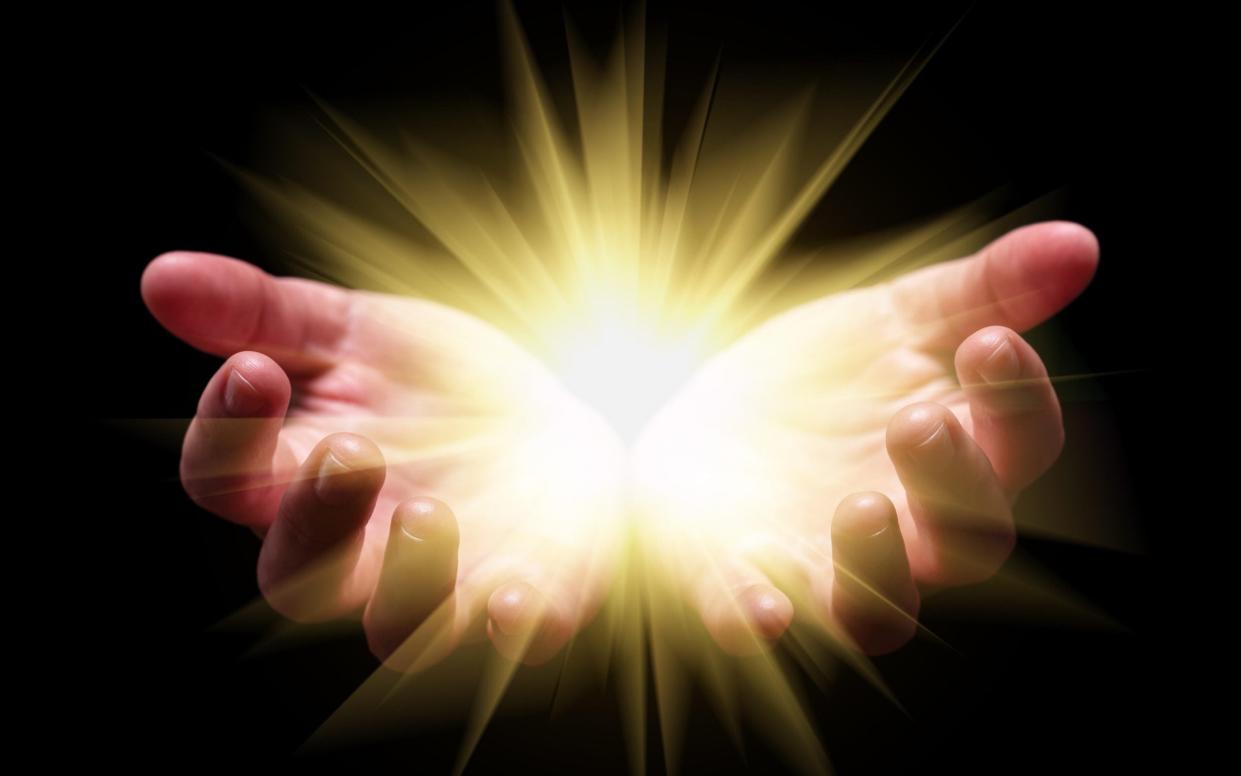 Light around hands - Alamy