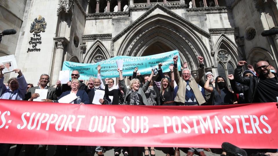 Postmasters celebrating their convictions being overturned outside the Royal Courts of Justive in 2021