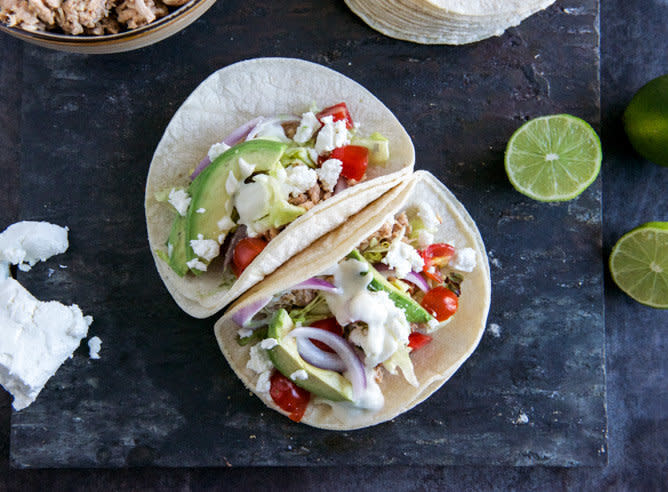 <strong>Get the <a href="http://www.howsweeteats.com/2013/03/smokey-roasted-chicken-tacos-with-spicy-goat-cheese-queso/" target="_blank">Smoky Roasted Chicken Tacos with Spicy Goat Cheese Queso recipe</a> from How Sweet It Is</strong>