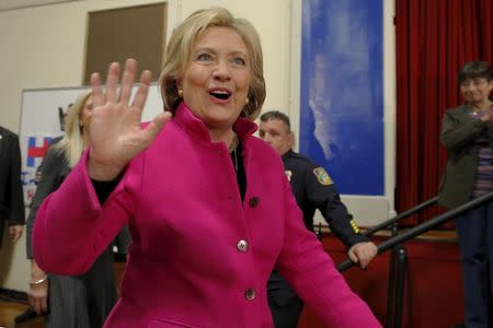 U.S. Democratic presidential candidate Hillary Clinton takes the stage for a campaign town hall meeting in Salem, New Hampshire December 8, 2015. REUTERS/Brian Snyder