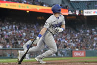 Los Angeles Dodgers' Billy McKinney watches his RBI single against the San Francisco Giants during the fifth inning of a baseball game in San Francisco, Tuesday, July 27, 2021. (AP Photo/Jeff Chiu)