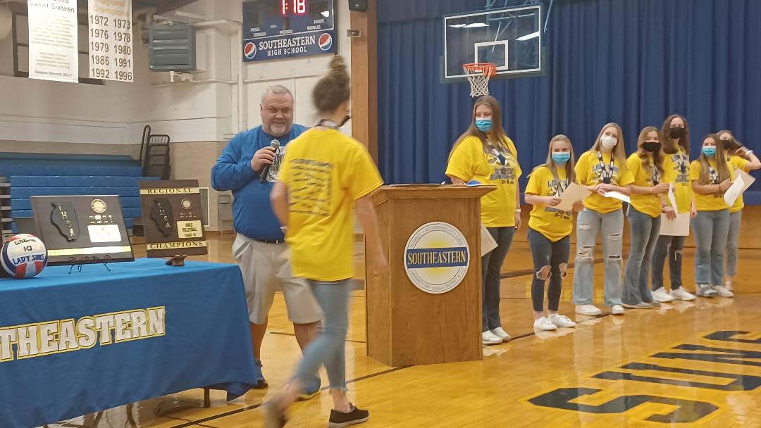 Shown here,Suns volleyball coach Tim Kerr announces and award for Abigail Shaffer during a reception for the varsity team, which earned runner up in the 1A state tournament. Kerr is optimistic about the Suns this coming postseason.