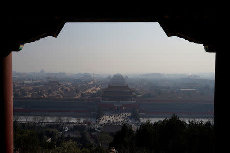 Forbidden City is seen amid smog ahead of Chinese Lunar New Year in Beijing, China February 13, 2018. Picture taken February 13, 2018. REUTERS/Jason Lee