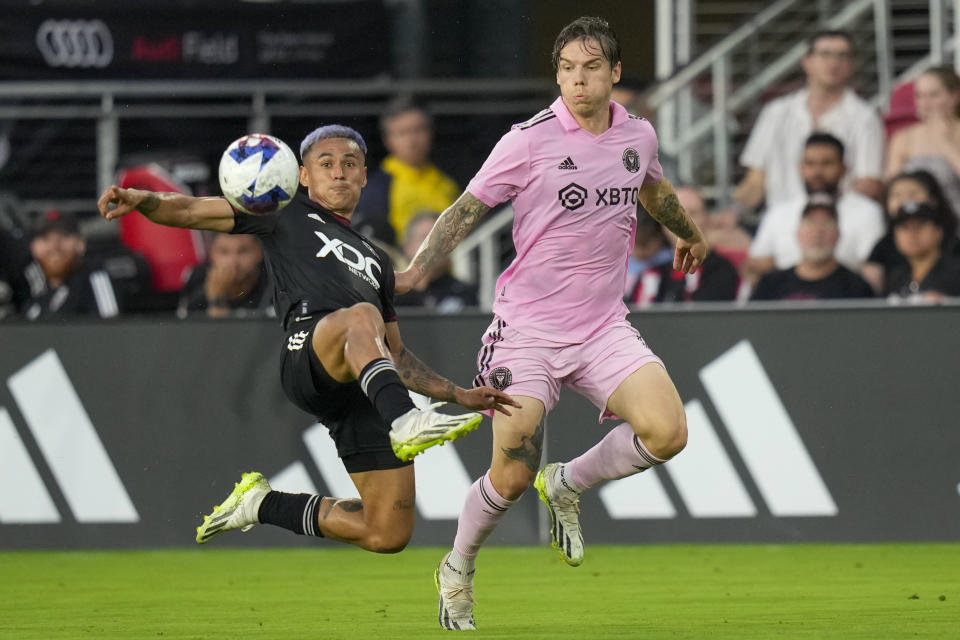D.C. United midfielder Andy Najar, left, and Inter Miami midfielder Robert Taylor go for the ball during the first half of an MLS soccer match Saturday, July 8, 2023, in Washington. (AP Photo/Alex Brandon)