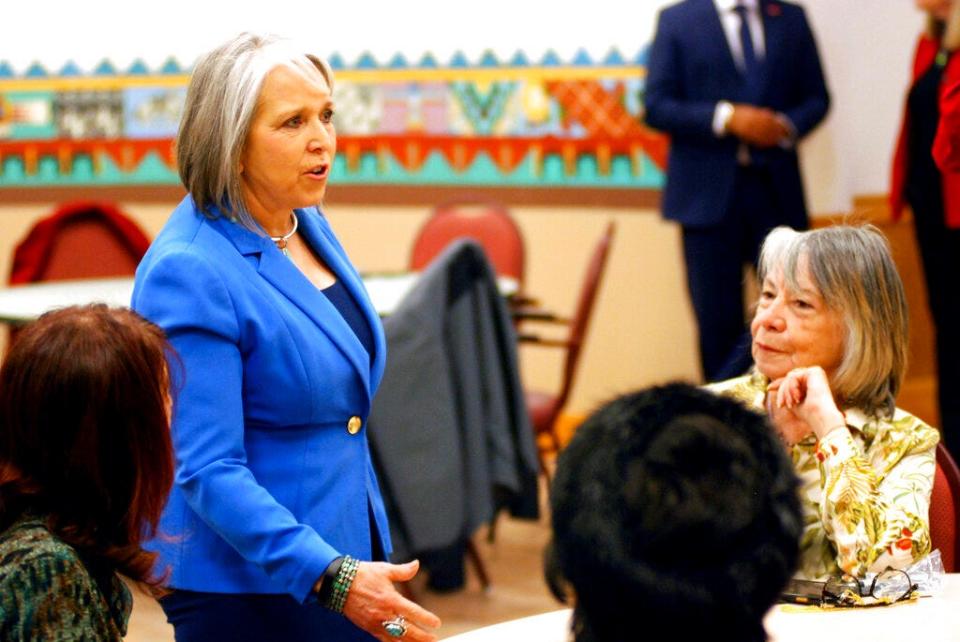 New Mexico Gov. Michelle Lujan Grisham talks with an audience at a retirement center in Santa Fe, N.M., on Tuesday, March 8, 2022. Lujan Grisham this week signed a $530 million tax relief package and an annual state budget that increases spending by $1 billion, or 14%.