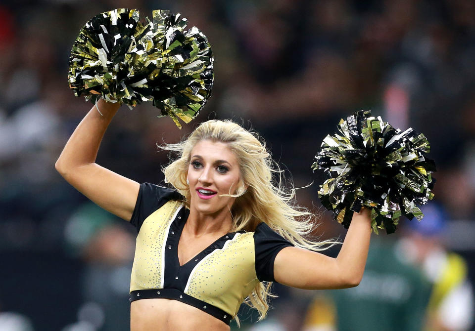 A New Orleans Saints cheerleader performs during a NFL game at the Mercedes-Benz Superdome on December 17, 2017 in New Orleans, Louisiana. (Photo by Sean Gardner/Getty Images)