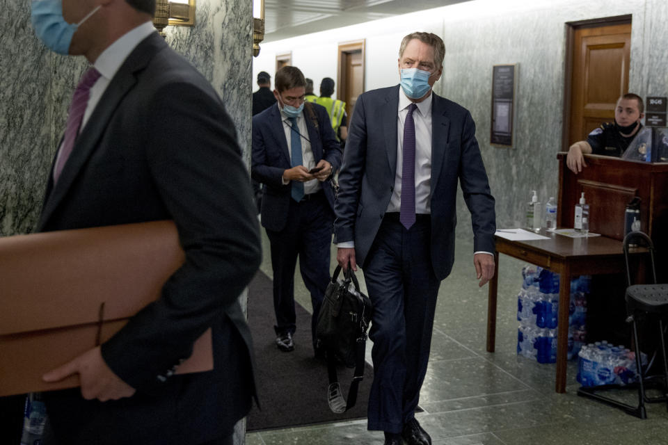 U.S. Trade Representative Robert Lighthizer arrives for a Senate Finance Committee hearing on U.S. trade on Capitol Hill, Wednesday, June 17, 2020, in Washington. (AP Photo/Andrew Harnik)