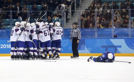 Ice Hockey - Pyeongchang 2018 Winter Olympics - Men's Playoff Match - Slovenia v Norway - Gangneung Hockey Centre, Gangneung, South Korea - February 20, 2018 - Players of Norway's team celebrate their win. REUTERS/Kim Kyung-Hoon