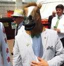 A spectator wearing a horse mask at the 138th Kentucky Derby horse race at Churchill Downs Saturday, May 5, 2012, in Louisville, Ky.