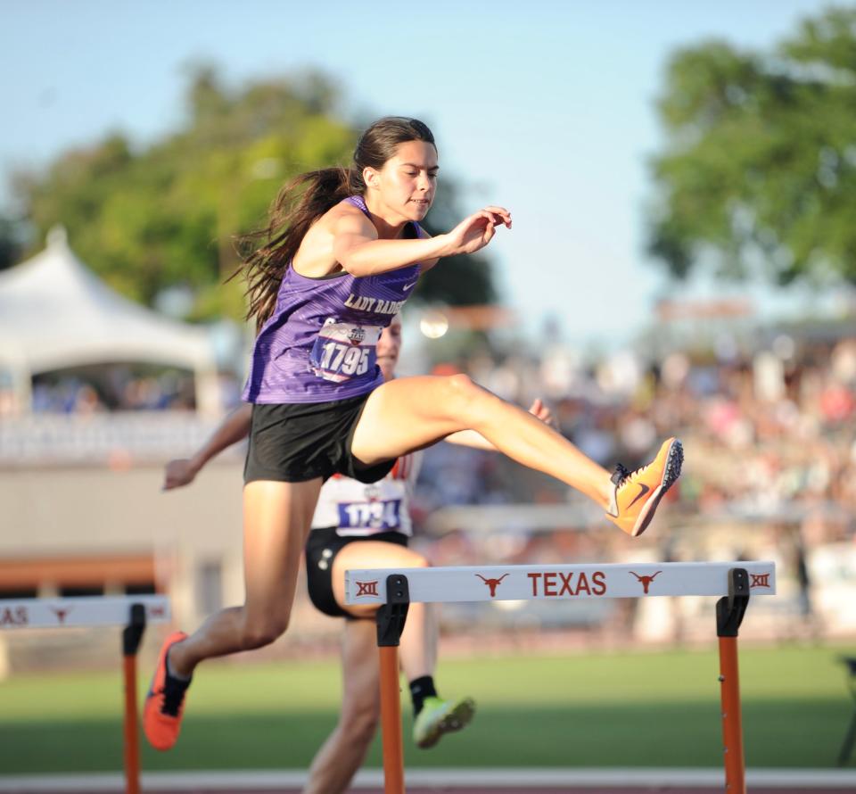 Merkel's Alyssa O'Malley competes in the 300 hurdles at the state track and field meet in Austin.