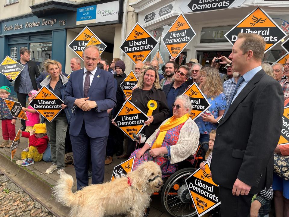 Lib Dem leader Ed Davey (centre left) with candidate Richard Foord (right) during Tiverton and Honiton by-election campaign launch in Honiton High Street. Picture date: Friday May 20, 2022.