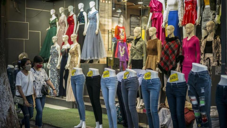 Jeans are displayed on mannequins outside a store during the Diwali festival in New Delhi, India, on Wednesday, Nov. 3, 2021. 