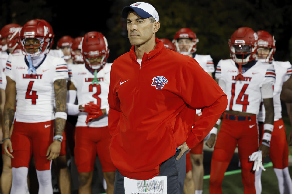 BOWLING GREEN, KY - OCTOBER 24: Liberty Flames head coach Jamey Chadwell stands with his team before a college football game against the Western Kentucky Hilltoppers on October 24, 2023 at Houchens Industries - L. T. Smith Stadium in Bowling Green, Kentucky. (Photo by Joe Robbins/Icon Sportswire via Getty Images)