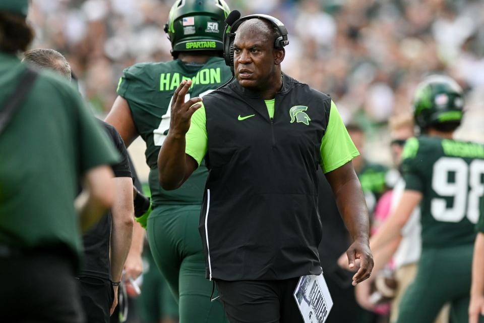 Michigan State's head coach Mel Tucker signals to players during the first quarter in the game against Akron on Saturday, Sept. 10, 2022, at Spartan Stadium in East Lansing.