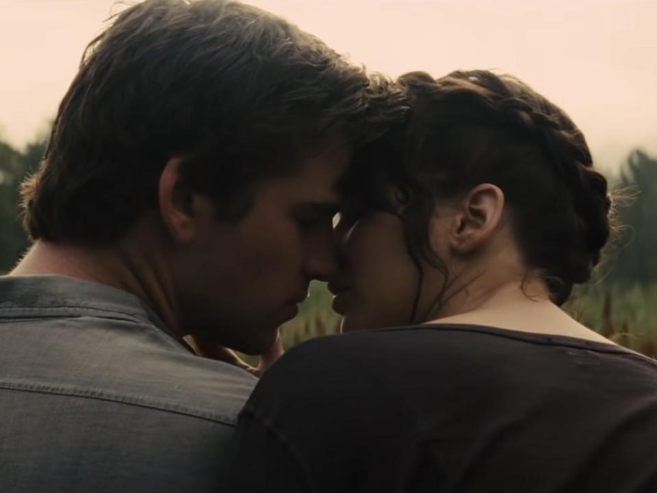 Gale and Katniss kissing in "The Hunger Games: Catching Fire."