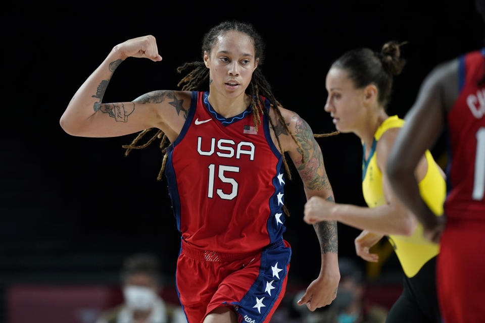 United States's Brittney Griner (15) flexes her muscle after making a basket during a women's basketball quarterfinal round game against Australia at the 2020 Summer Olympics, Wednesday, Aug. 4, 2021, in Saitama, Japan. (AP Photo/Charlie Neibergall)