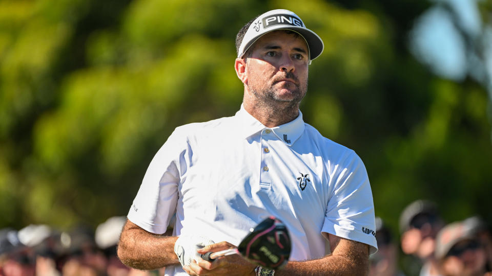   Bubba Watson looks on after hitting a drive 