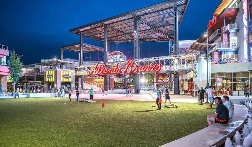 The Battery Atlanta has restaurants, retail and hotels adjacent to Truist Park, where the Braves play. University of Tennessee looked at The Battery to inspire its Neyland Entertainment District.