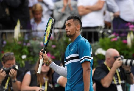 Tennis - ATP 500 - Fever-Tree Championships - The Queen's Club, London, Britain - June 19, 2018 Australia's Nick Kyrgios reacts after winning his first round match against Great Britain's Andy Murray Action Images via Reuters/Tony O'Brien