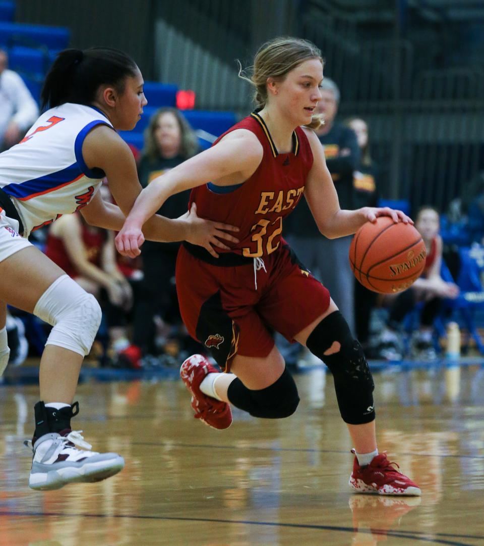 Bullitt East’s Lilly Reid (32) drives against the Southwestern defense during the Girls LIT at the Valley High School gym in Louisville, Ky. on Jan. 25, 2023.  