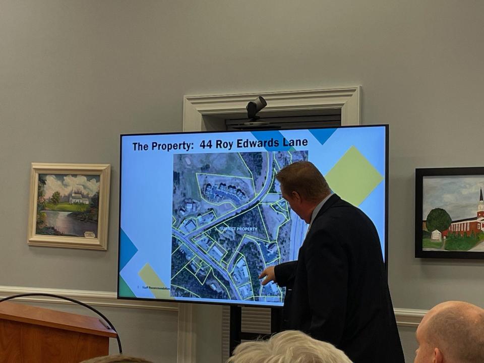 Mars Hill Town Manager Nathan Bennett outlines the property for Givens Estates proposed Mars Hill facility at 44 Roy Edwards Lane.