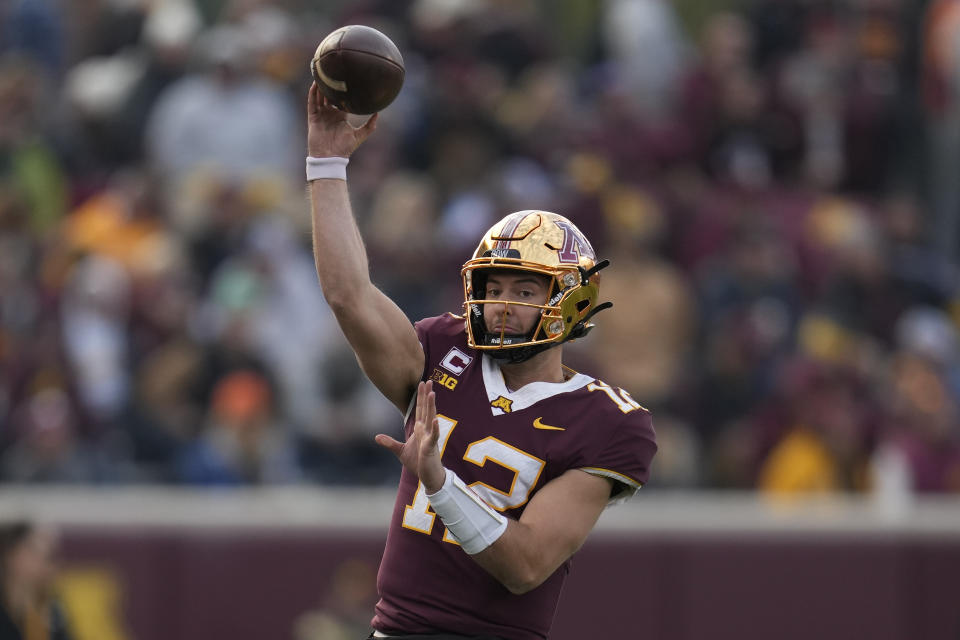 FILE - Minnesota quarterback Cole Kramer throws the football during a timeout in the second half of an NCAA college football game against Illinois, Nov. 4, 2023, in Minneapolis. The career backup will make his first start at quarterback for Minnesota in the Quick Lane Bowl on Tuesday, Dec. 26, against Bowling Green. (AP Photo/Abbie Parr, File)