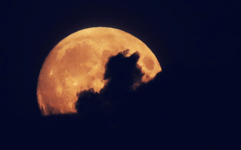 The waxing gibbous moon over Whitley Bay ahead of tonight’s lunar eclipse [Photo: PA]