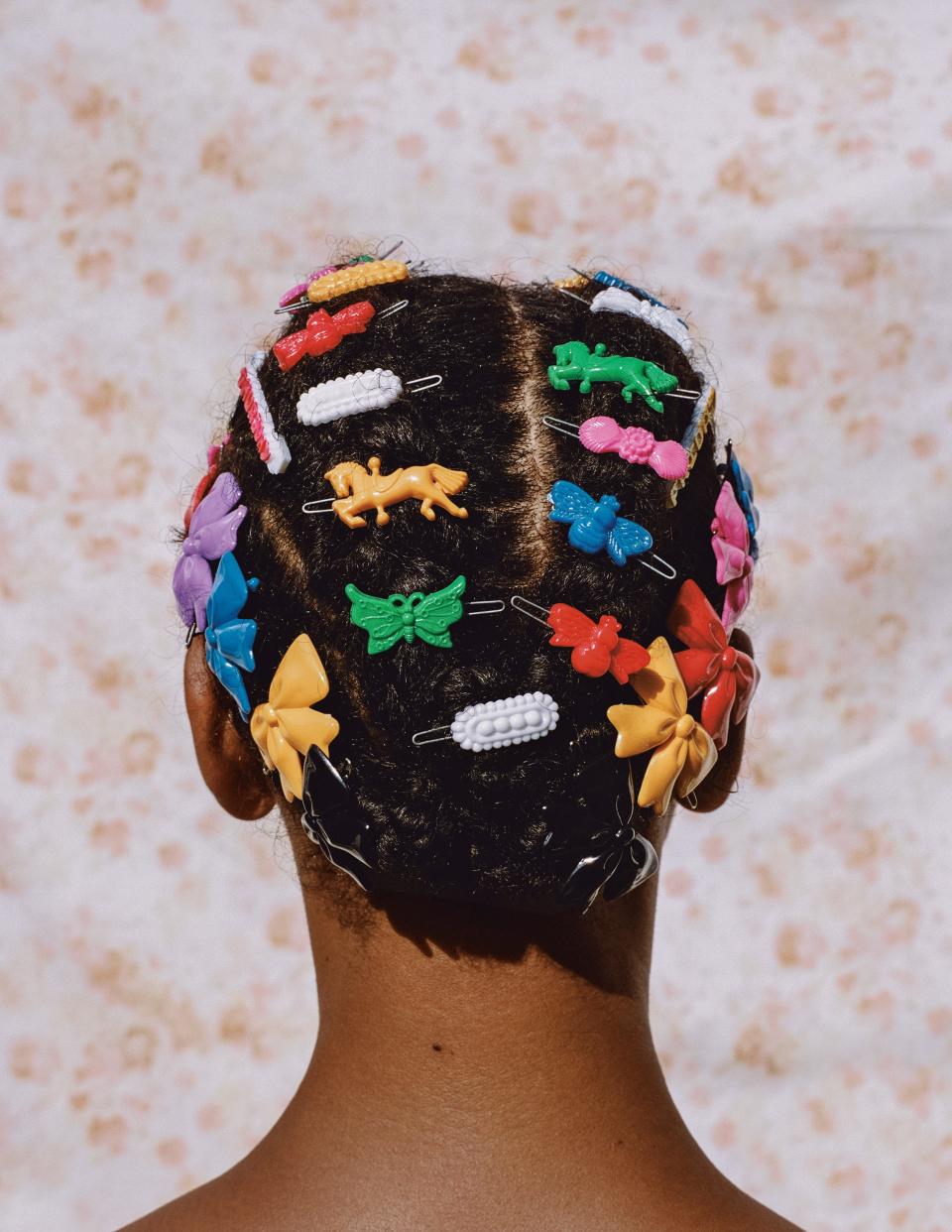 Micaiah Carter’s “Adeline in Barrettes,” a 2018 image on display at the Sarasota Art Museum in the exhibit “The New Black Vanguard: Photography between Art and Fashion.”