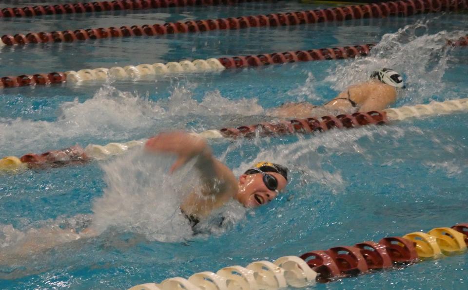 Watkins Memorial freshman Olivia Crock swims the 100 freestyle during a quad against Granville, Northridge and Johnstown at New Albany on Saturday, Jan. 28, 2023.